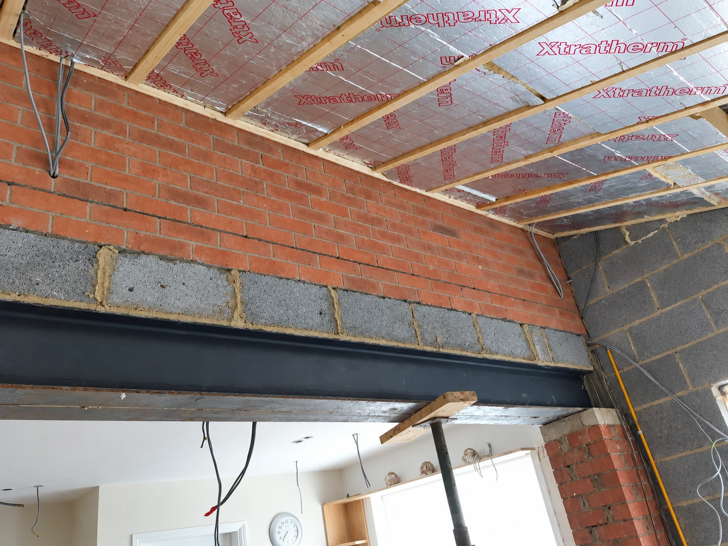 Steel beam over a knock through opening in North Tyneside
